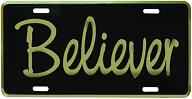 Believer icense Plate. License plates measure 6 x 12 with gold and black baked enamel finish, universal mounting slots.